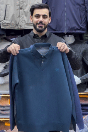 BLUE V-NECK SWEATER WITH EMBROIDERED LOGO